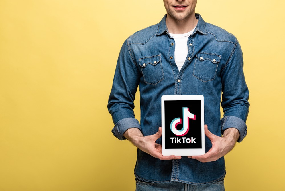 TikTok and the automotive industry, the success of a brand community, between creators and consumers, source DepositPhotos